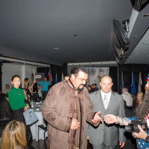 Action Star Steven Seagal and Gene Tosti, a SOCN Volunteer from Las Vegas, NV