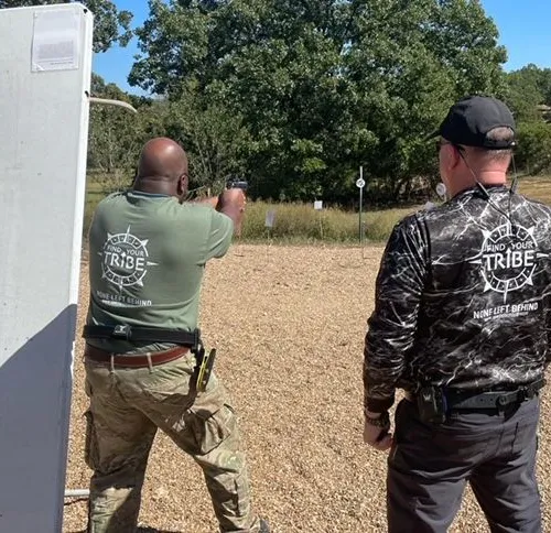 Mark coaching Gordon on advanced pistol skills- Sep 2022